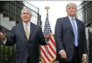  ?? PABLO MARTINEZ MONSIVAIS — THE ASSOCIATED PRESS FILE ?? In this Aug. 11 photo, Secretary of State Rex Tillerson, left, speaks following a meeting with President Donald Trump at Trump National Golf Club in Bedminster, N.J. The strained relationsh­ip between President Donald Trump and Secretary of State Rex...