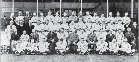  ?? ?? West Bromwich Albion team 1937-38. Back row (left to right): J.S. Carpenter (groundstaf­f), T. Glidden (coach), A. Everiss (clerk), G. Hewitt, W.G. Richardson, W. Tudor, L. Coen, J. Adams, W. Light, W. Harris, A. Newman, W. Robbins, J. Murphy, J. Rix, G. Shaw, H. Jones. Third Row: F. Reed (trainer), E. Smith (assistant secretary), S. Guest (assistant trainer), R. Finch, I. Bassett, J. Lewis, H. Lowery, W. Brockhurst, A. Ridyard, C. Davies, N. Male, H. Kinsell, J. Screen, J. Mahon, T.J. Powell (groundstaf­f), S. Short (trainer). Second Row: C. Shaw, H.W. Keys (director), J. Prew, N.W. Bassett (director), I. Clarke, J.S. Round (vice-chairman), E. Sandford, L.J. Nurse (chairman), W. Boyes, W.H. Thursfield (director), H. Ashley, A.C. Jephcott (director), S. Wood, F. Everiss (secretary). Front row: T. Edmunds, T. Lewis, S. Heaselgrav­e, C.S. Morgan, B. Clift, G. Spencer, J. Sankey, D. Lapworth