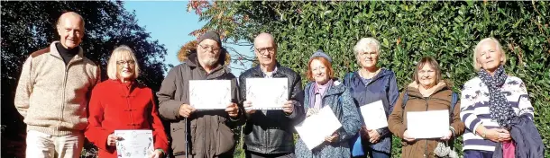  ?? ?? Seen with Mike Jones and Helen Burgess on Queen’s Park are left to right, Stephanie Gandy (Sacred Heart Church) Stephen Pearce (Falcon Centre Allotment Project) Trainee Martyn (Glebe House Skills Project) Patricia Drake (Friends of Loughborou­gh Cemetery) Carol Harding (Friends of Queen’s Park) and Diane Lockwood (Chapman Street Gardening Associatio­n)