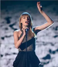  ?? ETHAN MILLER, GETTY IMAGES ?? Taylor Swift performs at the 48th Annual Academy of Country Music Awards at the MGM Grand Garden Arena on Sunday in Las Vegas.