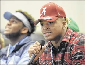  ?? DAVID BARNES / DAVID BARNES@AJC.COM ?? Recruits such as Xavier McKinney of Roswell, who committed to Alabama, could do so in an early signing period in December starting this year, if NCAA changes win final OK.