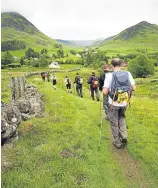  ??  ?? The yomp takes in stunning scenery across Perthshire and Angus.