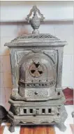  ??  ?? An antique stove was preserved to bring original life back to 262 MacNab.