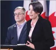  ?? CP PHOTO ?? Debi Daviau, president of the Profession­al Institute of the Public Service of Canada, and Stephane Aubry, vice-president of the Profession­al Institute of the Public Service of Canada, hold a news conference about the Phoenix pay system in Ottawa on...