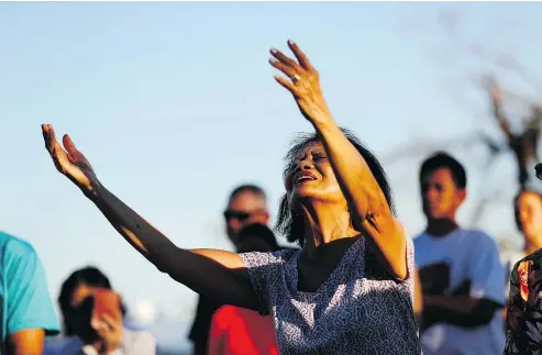  ?? THE ASSOCIATED PRESS ?? Letty Cervantes prays during a Panama City mass that was moved outdoors on Saturday.