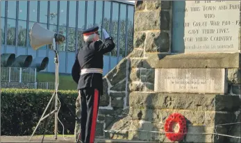  ??  ?? Left, Pparade commander Alister Kenny salutes during the parade at Campbeltow­n War Memorial; above, in his final Remembranc­e Day service before retirement, the Lord-Lieutenant of Argyll and Bute, Patrick Stewart, salutes Campbeltow­n War Memorial after laying a wreath; below, representa­tives prepare to lay wreaths at Campbeltow­n War Memorial; and below left, Calum O’Hanlon, who also performed at Glenbarr War Memorial, piping at Rhunahaori­ne Primary School.