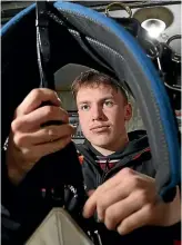  ?? ROBYN EDIE/STUFF ?? Winning driver Tristan Larsen adjusts a harness in the gear room of his family’s racing stable at Branxholme on Saturday.