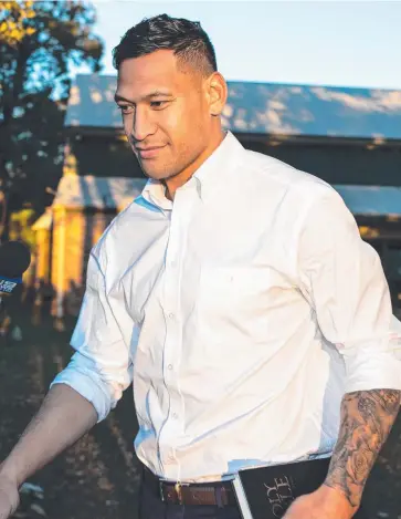  ??  ?? FIRE AND BRIMSTONE: Devoutly outspoken Christian Israel Folau leaving church on the weekend.