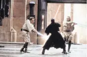  ?? KEITH HAMSHERE Lucasfilm Ltd./Zuma Press/TNS ?? From left, Obi-Wan Kenobi (Ewan McGregor), Darth Maul (Ray Park) and Qui-Gon Jinn (Liam Neeson) in the climactic lightsaber duel of “Star Wars: Episode I: The Phantom Menace.”