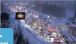  ??  ?? GRIDLOCK Traffic at a standstill on the M80 on Wednesday