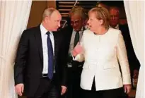  ??  ?? Angela Merkel und Wladimir Putin (l.) bei ihrem Treffen Mitte Mai in Sotschi. Foto: Mikhail Klimentyev