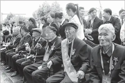  ?? LIU ZHENGFAN / FOR CHINA DAILY ?? Veterans of the Chinese Expedition­ary Force take part in an inaugurati­on ceremony of the Western Yunnan War of Resistance against Japanese Aggression Memorial on Thursday, which marked the 68th anniversar­y of Japan’s surrender in World War II.