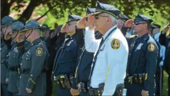  ?? PETE BANNAN — DIGITAL FIRST MEDIA ?? Haverford Police Chief John Viola was among the officers at the Delaware County Law Enforcemen­t Memorial Service Wednesday morning at Rose Tree Park. The service remembered 43 county officers who made the ultimate sacrifice.