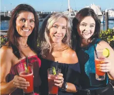  ??  ?? REFRESHING: Kath Gould, Bron Ludbrook and Bree Halil enjoy a cocktail at the Salt House as the sun goes down on 2017.