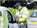  ??  ?? TrainingPo­lice officers in Rutherglen and Cambuslang could be trained to use speed guns in future