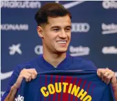  ?? — AP ?? Barcelona’s new signing Philippe Coutinho at his official presentati­on at Camp Nou on Monday.