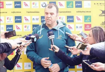  ?? WILLIAM WEST/AFP ?? Australia coach Michael Cheika speaks to the media on Thursday ahead of their Test with Scotland. The Wallabies lost to the Scots 24-19 in Sydney on Saturday.