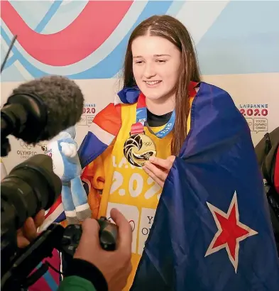  ?? OISPHOTOS/ OLYMPIC.ORG.NZ ?? Fourteen-yearold ice hockey player Katya Blong became the centre of unexpected media attention after winning New Zealand’s first gold medal at a Youth Winter Olympics.