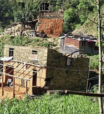  ??  ?? 1 now commonplac­e on Kathmandu pavements, brightly coloured tarpaulin tents belie the desperate situation of their occupants.
2 this is what it’s like inside those tents, which are now homes not only for those who have lost theirs but also for many...