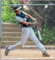  ?? PETE BANNAN — DIGITAL FIRST MEDIA ?? Marple Township Little League All-Star Jake Micewski unloads on a three-run home run in the first inning Monday of a District 19 Little League Majors championsh­ip round game, won by Marple 10-1 over Drexel Hill. The teams meet again Tuesday for the...