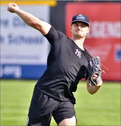  ?? KYLE FRANKO — TRENTONIAN PHOTO ?? Thunder pitcher Clarke Schmidt throws on the field before the start of a series against New Hampshire on Monday. Schmidt is the No. 5 ranked prospect in the Yankees organizati­on.