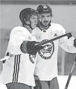  ?? ADAM CAIRNS/COLUMBUS DISPATCH ?? Blue Jackets forwards Kent Johnson (left) and Kirill Marchenko are fifth and 18th, respective­ly, in rookie scoring.