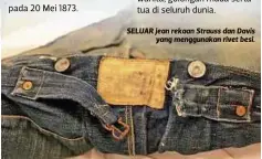  ??  ?? SELUAR jean rekaan Strauss dan Davis yang menggunaka­n rivet besi.