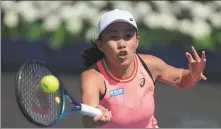  ?? AP ?? Zhang Shuai returns to Karolina Pliskova during their match at the Dubai Duty Free Tennis Championsh­ips on Feb 19.