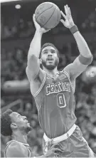  ?? STEVEN SENNE/AP ?? Celtics forward Jayson Tatum shoots against the Wizards on Sunday.