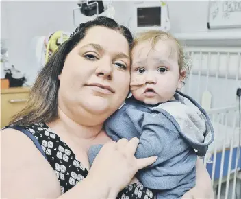  ??  ?? Ashley and Benjamin at the hospital in Newcastle