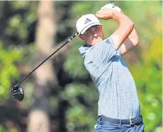  ?? — AFP photo ?? Åberg plays his shot from the 11th tee during the final round of the 2024 Masters Tournament at Augusta National Golf Club in Augusta, Georgia.