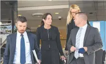  ??  ?? Wife of slain policeman Brett Forte, Susie Forte, with legal representa­tives at the Toowoomba Courthouse during the first day of a coroner’s inquest into her husband’s murder.