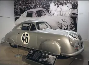  ??  ?? This 1951 Porsche 356 SL Gmund Coupe could reach 100 mph and was built to run at Le Mans.