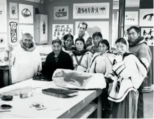  ??  ?? BELOW Terry Ryan (back) with artists Parr, Kiakshuk, Pitseolak Ashoona, Kenojuak Ashevak, Eegyvadluk Ragee, Lucy Qinnuayuak, Napachie Pootoogook and Pudlo Pudlat in Kinngait, 1961