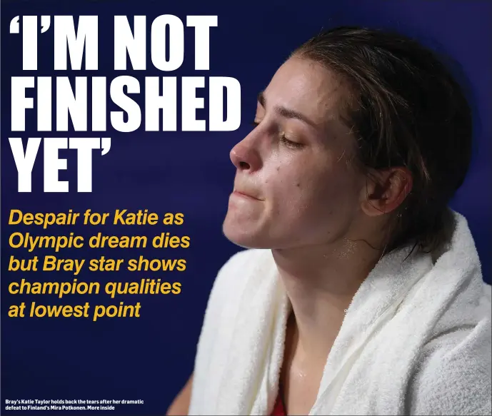  ??  ?? Bray’s Katie Taylor holds back the tears after her dramatic defeat to Finland’s Mira Potkonen. More inside