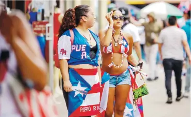  ?? Enviada especial/stephanie rojas ?? En la víspera del Desfile Puertorriq­ueño de Nueva York, miles se sumaron al tradiciona­l Festival Boricua de la Calle 116 en el barrio, que enciende la mecha para la manifestac­ión de hoy a través de la quinta avenida de la Gran Manzana.