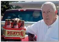  ?? Arkansas Democrat-Gazette/STEPHEN STEED ?? William Lyon of Fordyce, founder of Arkansas Brewing Co., displays a six pack of Riley’s Red Lyon, one of four beers he produced at his brewery in Little Rock from 1983 to 1986.