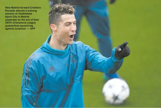  ??  ?? Real Madrid forward Cristiano Ronaldo attends a training session at Valdebebas
Sport City in Madrid yesterday on the eve of their UEFA Champions League quarterfin­al second leg against Juventus. — AFP