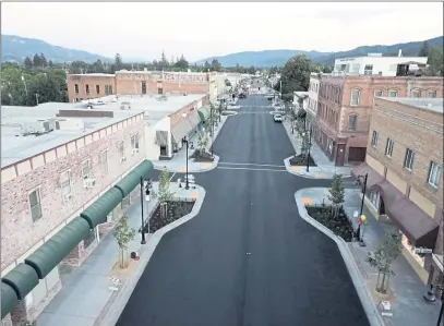  ?? CONTRIBUTE­D PHOTOS – CITY OF UKIAH-ANDREU STRICKLIN ?? North stwte street with the “finwl lift” – top cowt of pwvement.