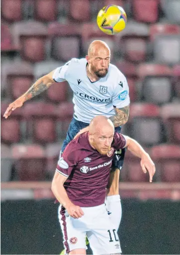  ??  ?? BROKEN BONE: Jordon Forster, pictured challengin­g Liam Boyce, misses visit of Morton.