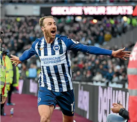  ?? GETTY IMAGES ?? Brighton and Hove Albion striker Glenn Murray celebrates after scoring a goal against West Ham in February before the Premier League season was halted.
