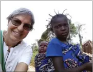  ?? SISTER LUZIA PREMOLI VIA AP ?? Sister Luzia Premoli takes a selfie with a young girl Feb. 12 in the village of Bagandou in the Central African Republic. In 2014 Pope Francis appointed Premoli to a Vatican congregati­on and she became the first women in the history of the Catholic Church to take on this role.