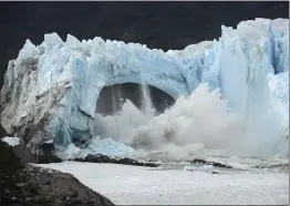  ?? FRANCISCO MUNOZ — THE ASSOCIATED PRESS FILE ?? Chunks of ice break off the Perito Moreno Glacier in Lake Argentina at Los Glaciares National Park near El Calafate in Argentina's Patagonia region on March 10, 2016.