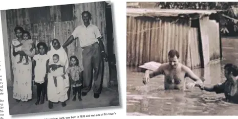  ??  ?? A RESIDENT is coaxed to wade through the flood water with some help. one of Tin Town’s in 1930 and was right, was born
‘Papwa’ Sewgolum,
THE golfer Sewsunker with his family.
He is pictured here famed residents.