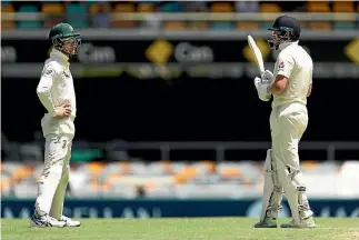  ?? GETTY IMAGES ?? Cameron Bancroft exchanges pleasantri­es with Jonny Bairstow during the first test.