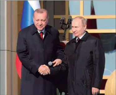  ??  ?? ALIANZA. Presidente­s de Turquía y Rusia.