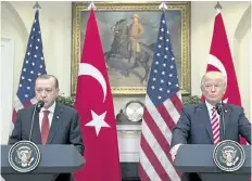  ?? MICHAEL REYNOLDS-POOL/GETTY IMAGES ?? U.S. President Donald Trump (right) and President of Turkey Recep Tayyip Erdogan deliver joint statements in the Roosevelt Room of the White House on Tuesday in Washington, D.C. Erdogan’s bodyguards clashed with protesters outside of the Turkish...