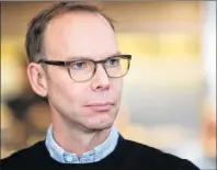  ?? STEPHEN BRASHEAR/THE ASSOCIATED PRESS ?? In this Dec. 15, 2015, file photo, Chipotle Mexican Grill founder and CEO Steve Ells pauses for a moment during an interview with The Associated Press in a Chipotle restaurant in Seattle.