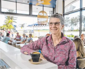  ?? Picture: JERAD WILLIAMS ?? Rhapsody Beachside cafe owner Jennifer Orr is ready for the GC600.