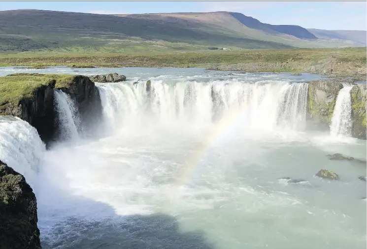  ?? PHOTOS: TIM JOHNSON ?? The tumbling majesty of Godsfoss — the waterfall of the gods — is just one of many stunning sights in Iceland, a country of abundant natural wonders.